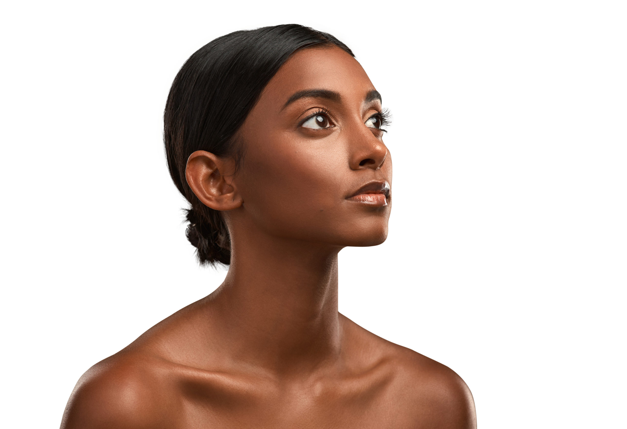 Side shot of a beautiful young woman posing against an isolated transparent png background | Ella Esthetics in Alexandria, VA